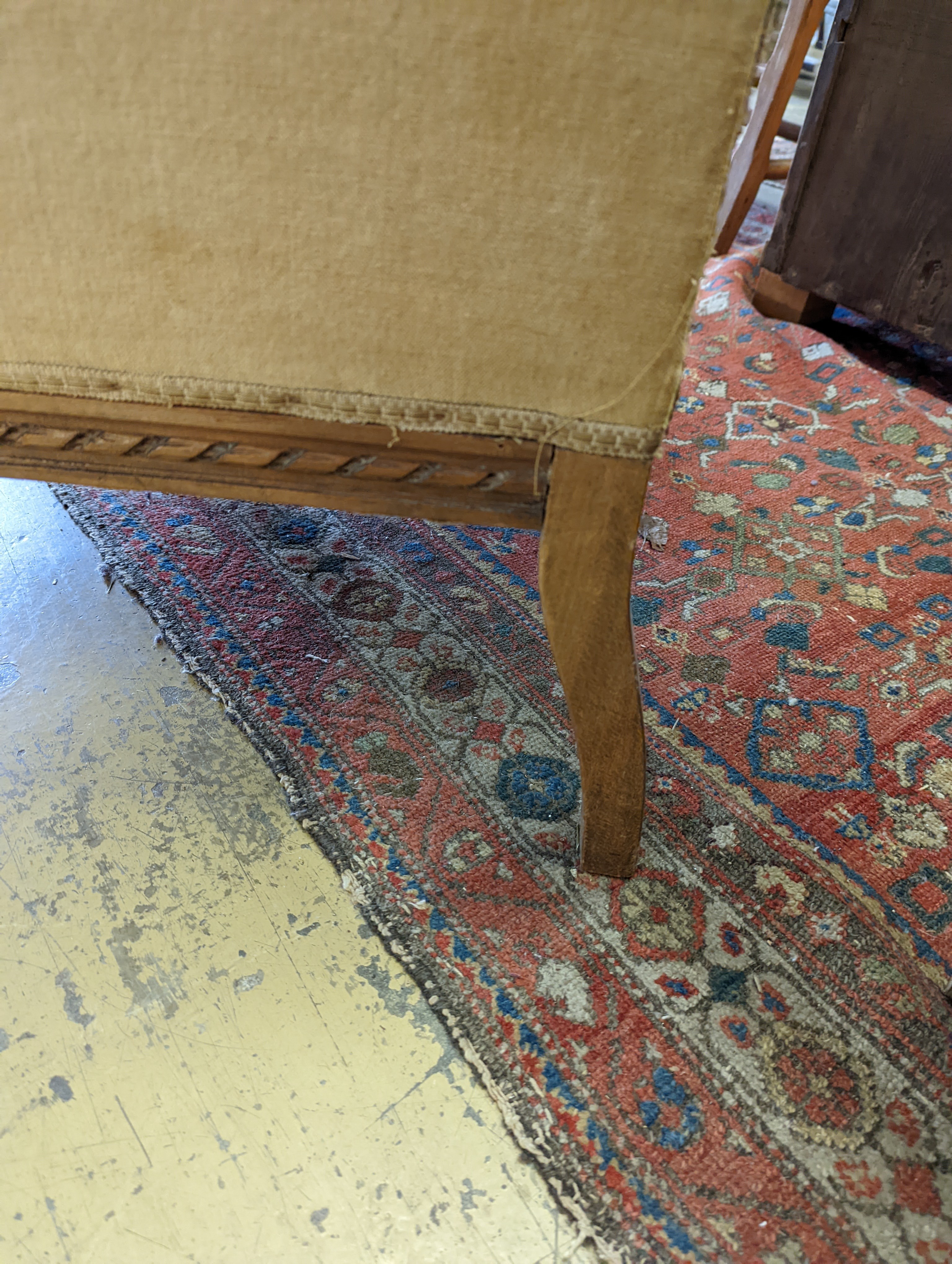 A late 19th century French carved beech armchair